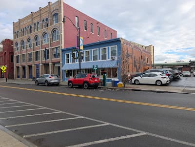 Warmly lit restaurant interior with tables and ambient lighting
