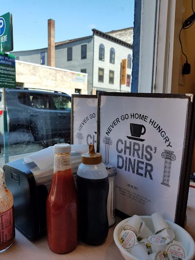 Elegant table setting with wine glasses and warm candlelight